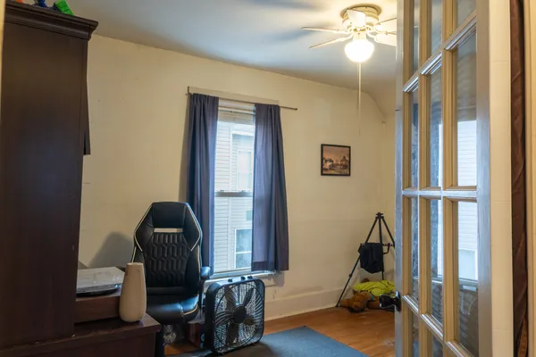 a view of a livingroom with furniture and entryway