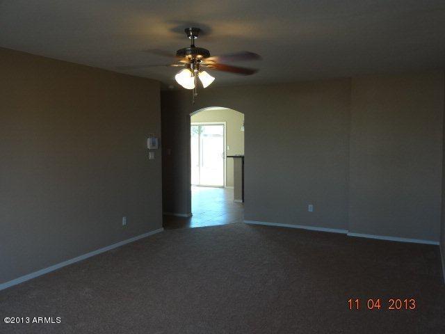 3701 West Wethersfield Road Phoenix, AZ 85029 - Photo 3 of 14 Living Room- new carpet and paint