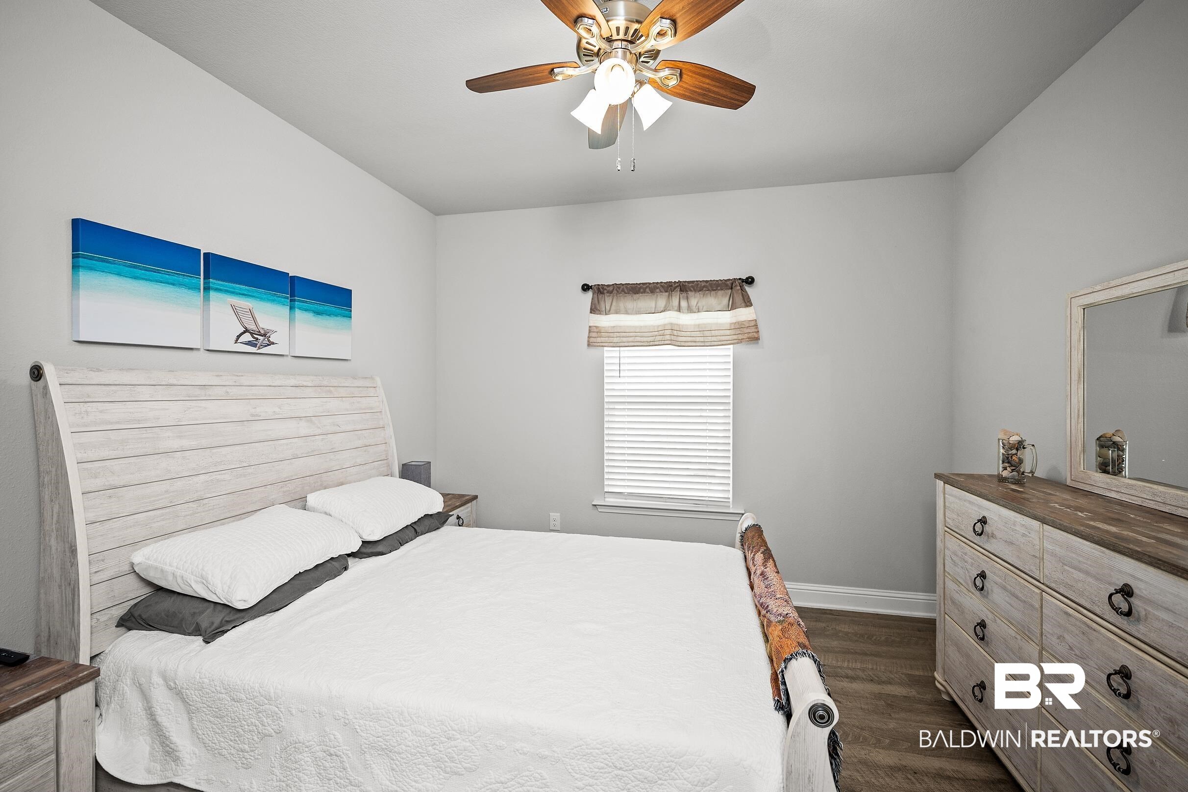 31468 Memphis Loop Daphne, AL 36527 - Photo 18 of 24 Bedroom with a ceiling fan and dark wood finished floors