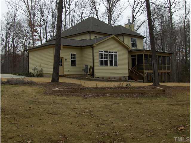 1716 Struble Circle Willow Spring, NC 27592 - Photo 20 of 25 a front view of a house with a yard
