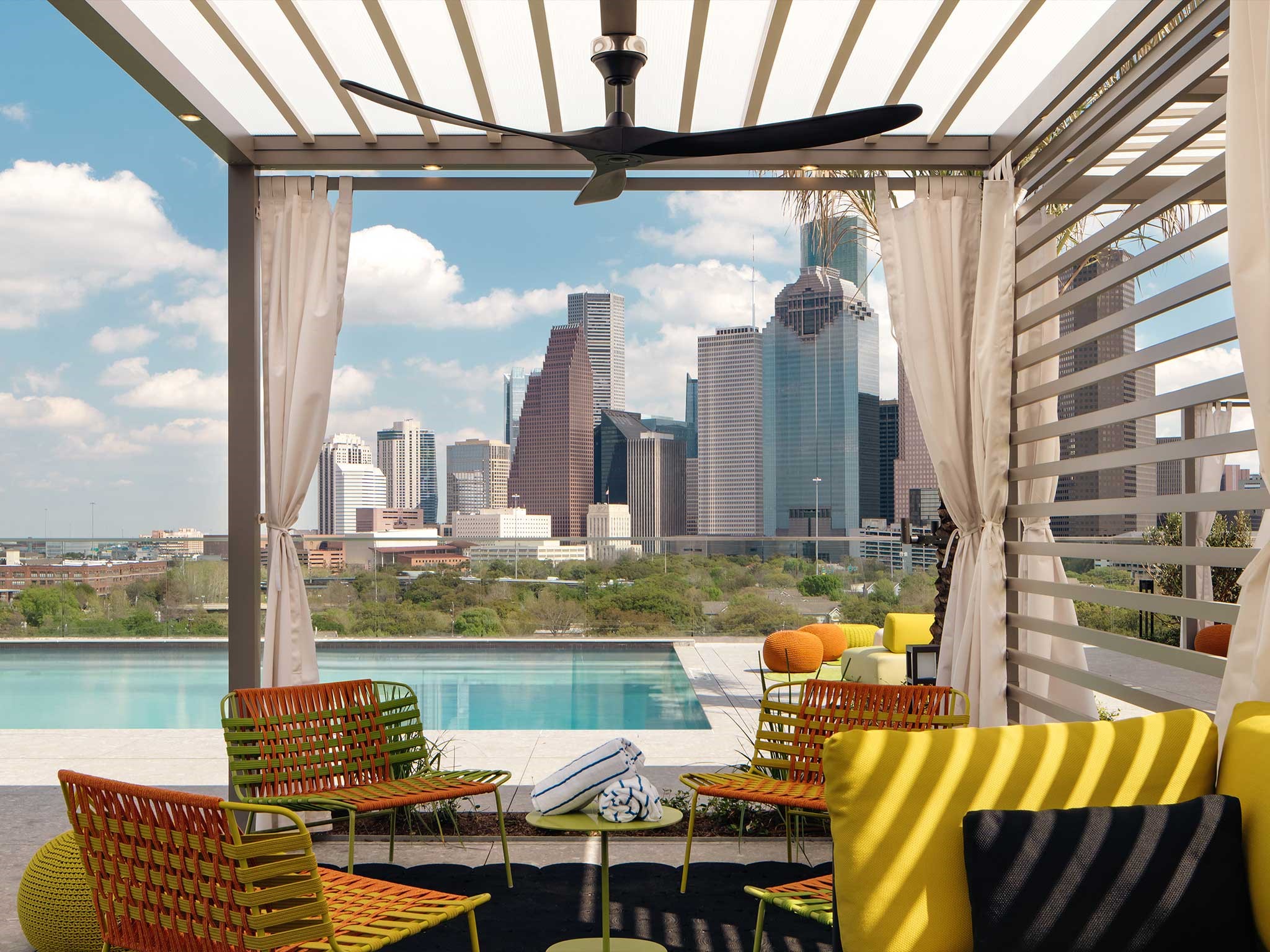 1711 Allen Parkway, Unit 1805 Houston, TX 77019 - Photo 36 of 43 Residents at the Allen and Thompson Hotel pool.