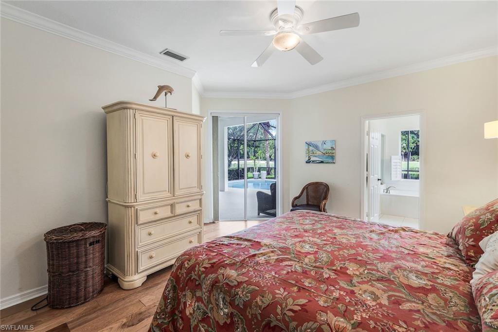 17983 Modena Road Miromar Lakes, FL 33913 - Photo 14 of 44 Bedroom with light hardwood / wood-style floors, crown molding, access to exterior, and ceiling fan