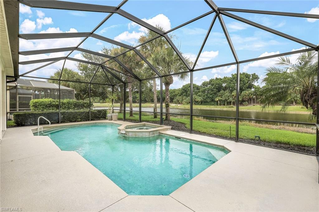 17983 Modena Road Miromar Lakes, FL 33913 - Photo 10 of 44 View of swimming pool with a patio, an in ground hot tub, and a lanai and golf and water view.