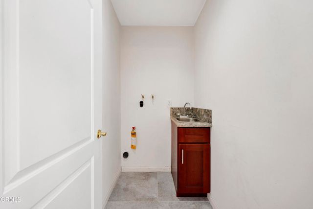 a view of hallway with sink