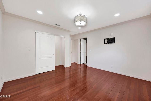 a view of a livingroom with furniture and a fireplace
