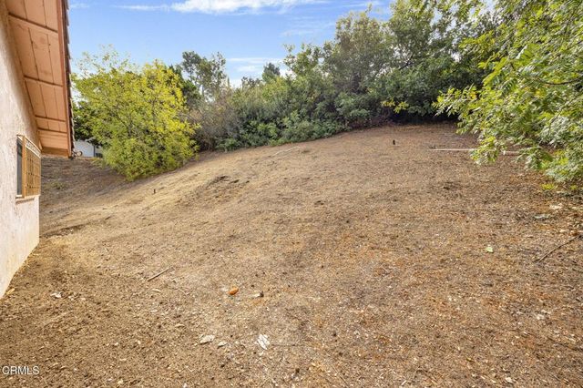 a view of a livingroom with furniture