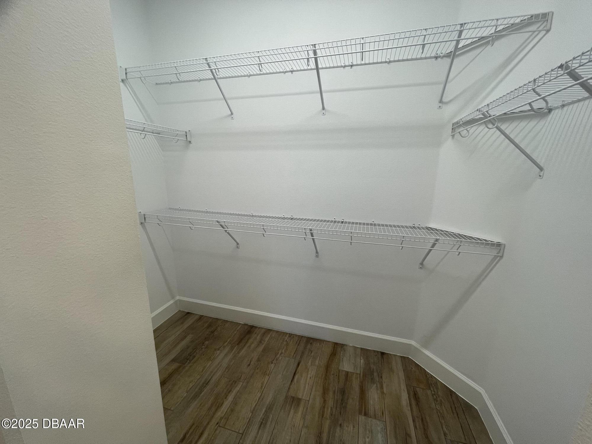 231 Ocean Hammock Loop Daytona Beach, FL 32124 - Photo 16 of 39 a view of small space with racks on the wall