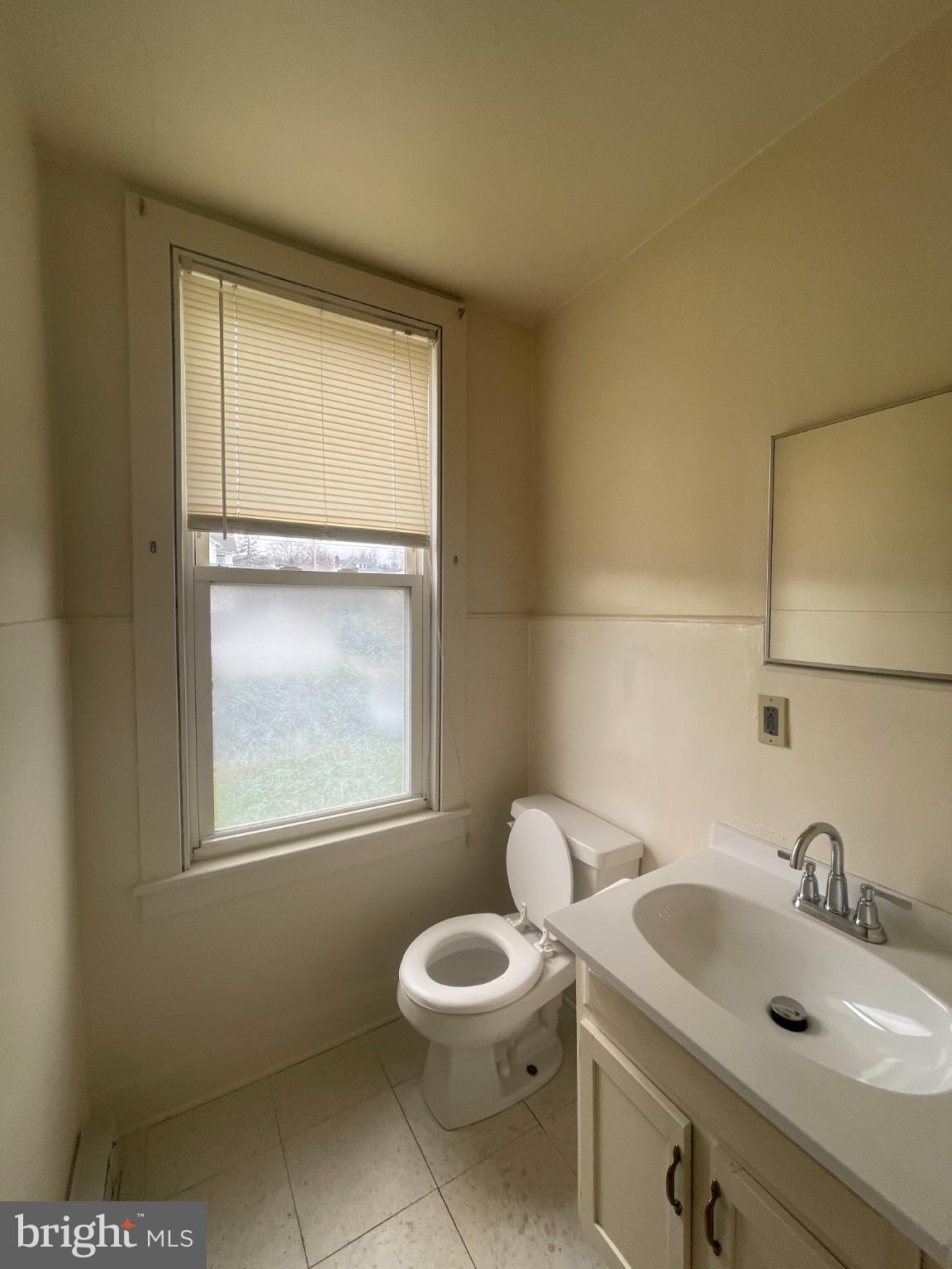 452 West 1st Street, Unit 5 Birdsboro, PA 19508 - Photo 4 of 10 a bathroom with a sink and a toilet