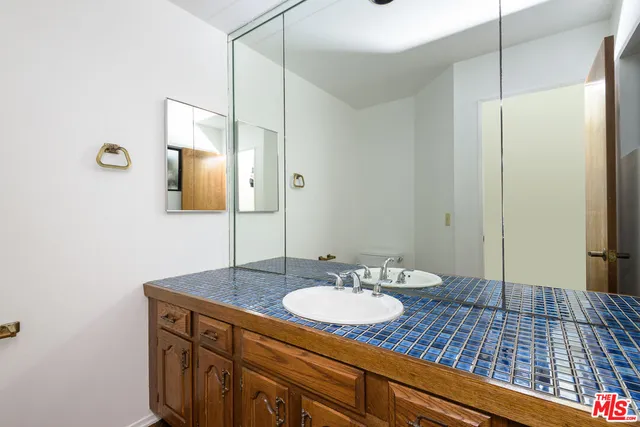 a view of front door with wooden floor