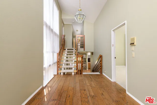 a view of dining room with wooden floor