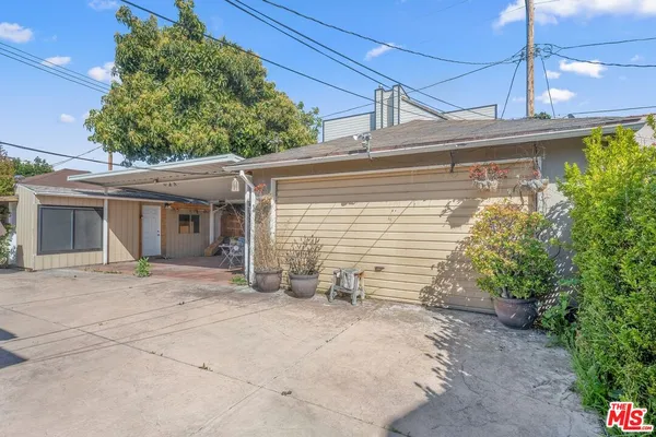 a view of a house with a window and a porch