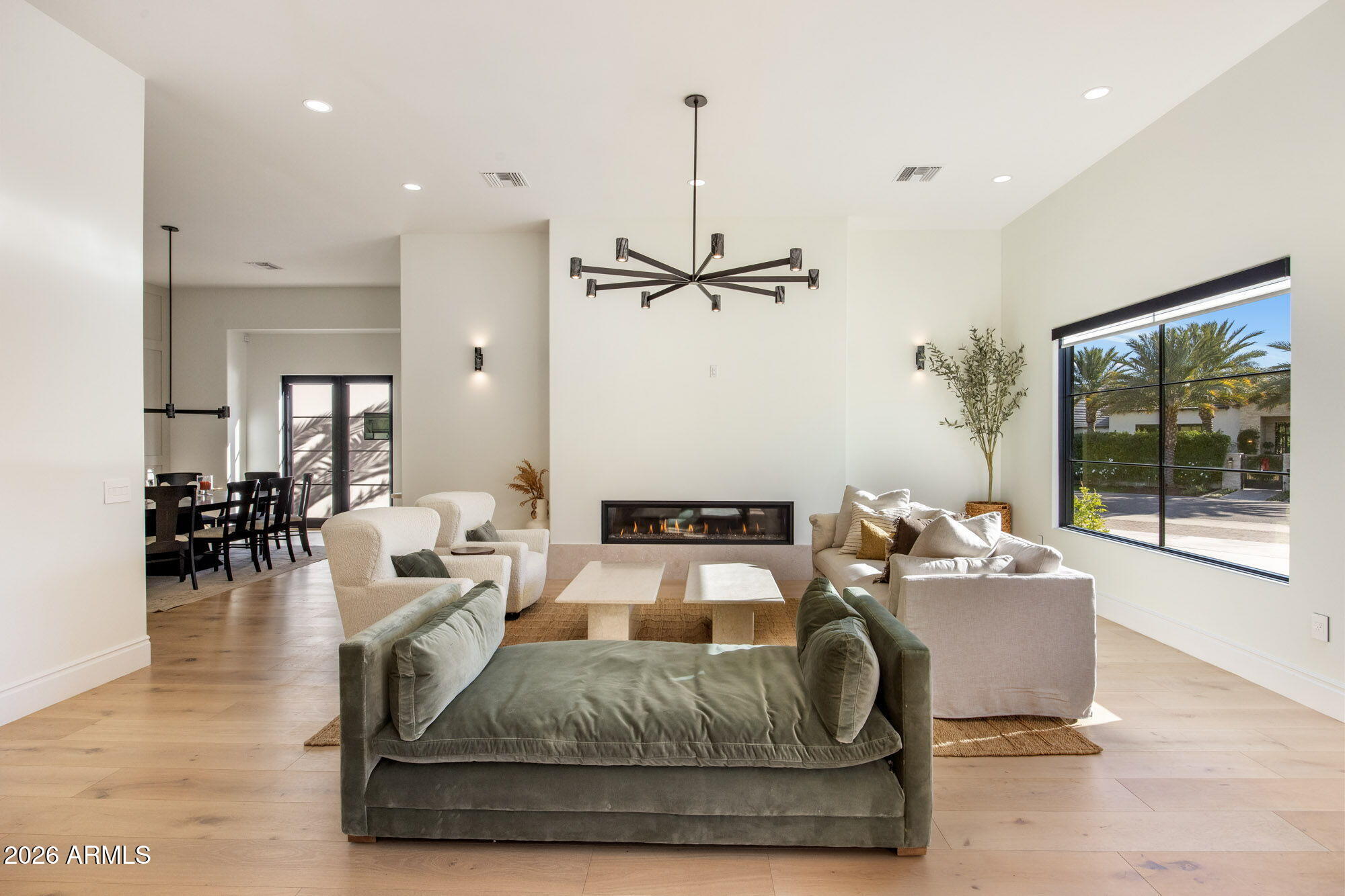 8625 Morning Glory Road Paradise Valley, AZ 85253 - Photo 12 of 52 a living room with furniture and a table
