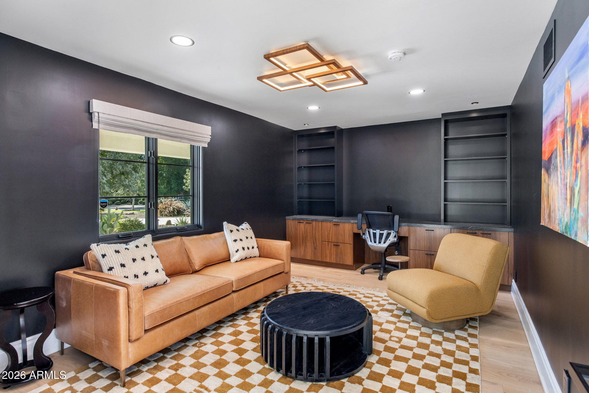 8625 Morning Glory Road Paradise Valley, AZ 85253 - Photo 13 of 52 a living room with furniture and a large window