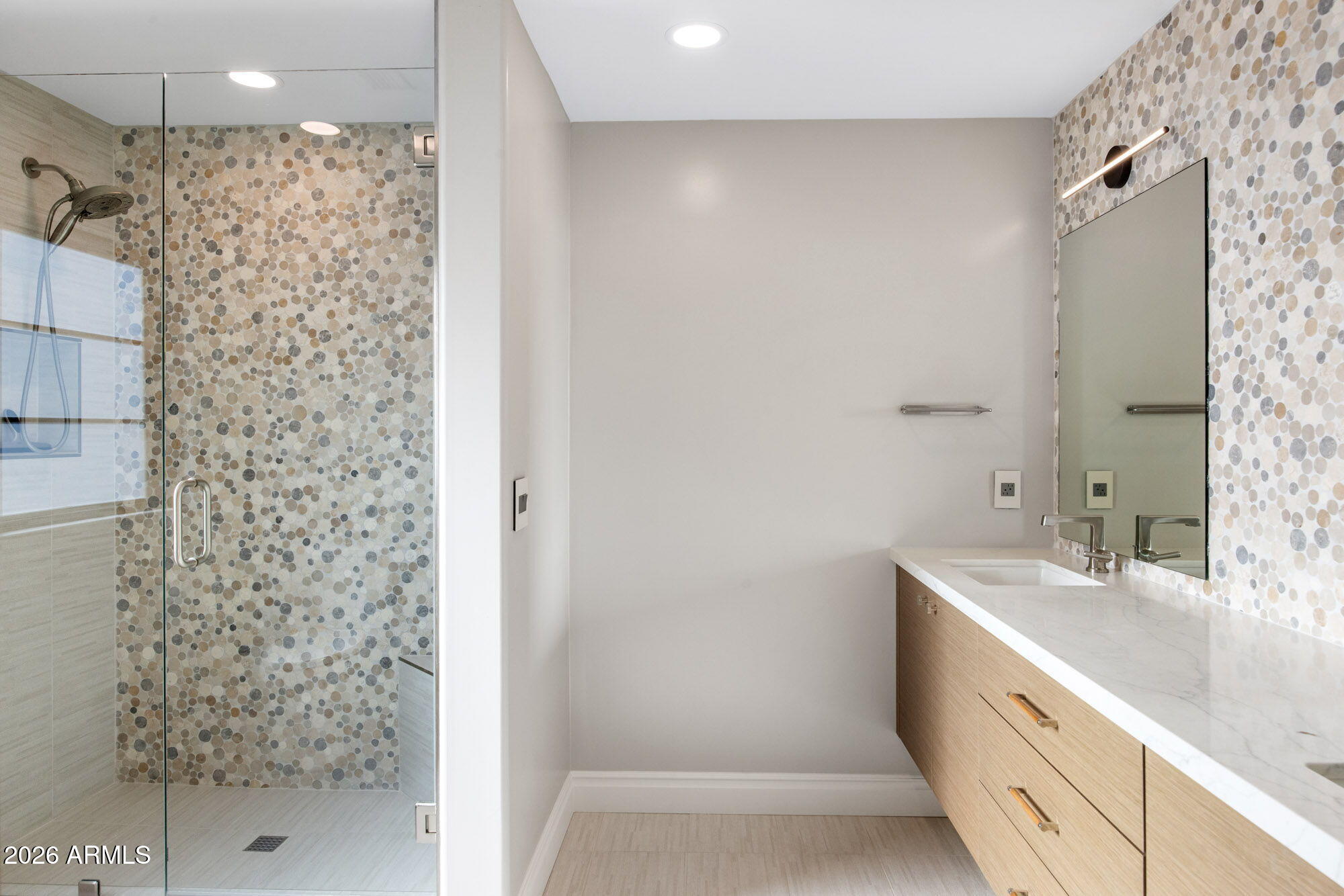 8625 Morning Glory Road Paradise Valley, AZ 85253 - Photo 41 of 52 a bathroom with a shower and a sink