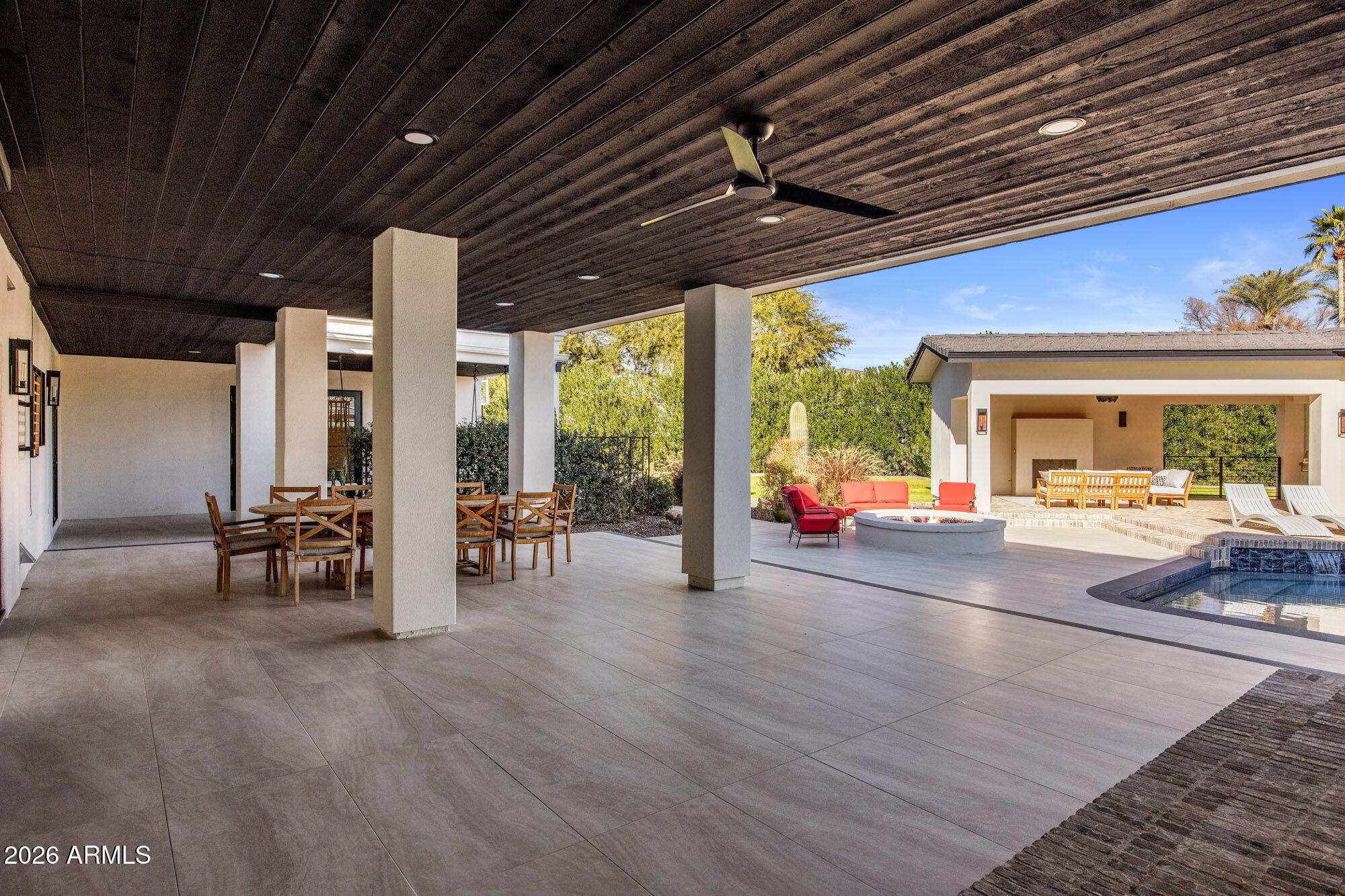 8625 Morning Glory Road Paradise Valley, AZ 85253 - Photo 42 of 52 a view of a porch and garden