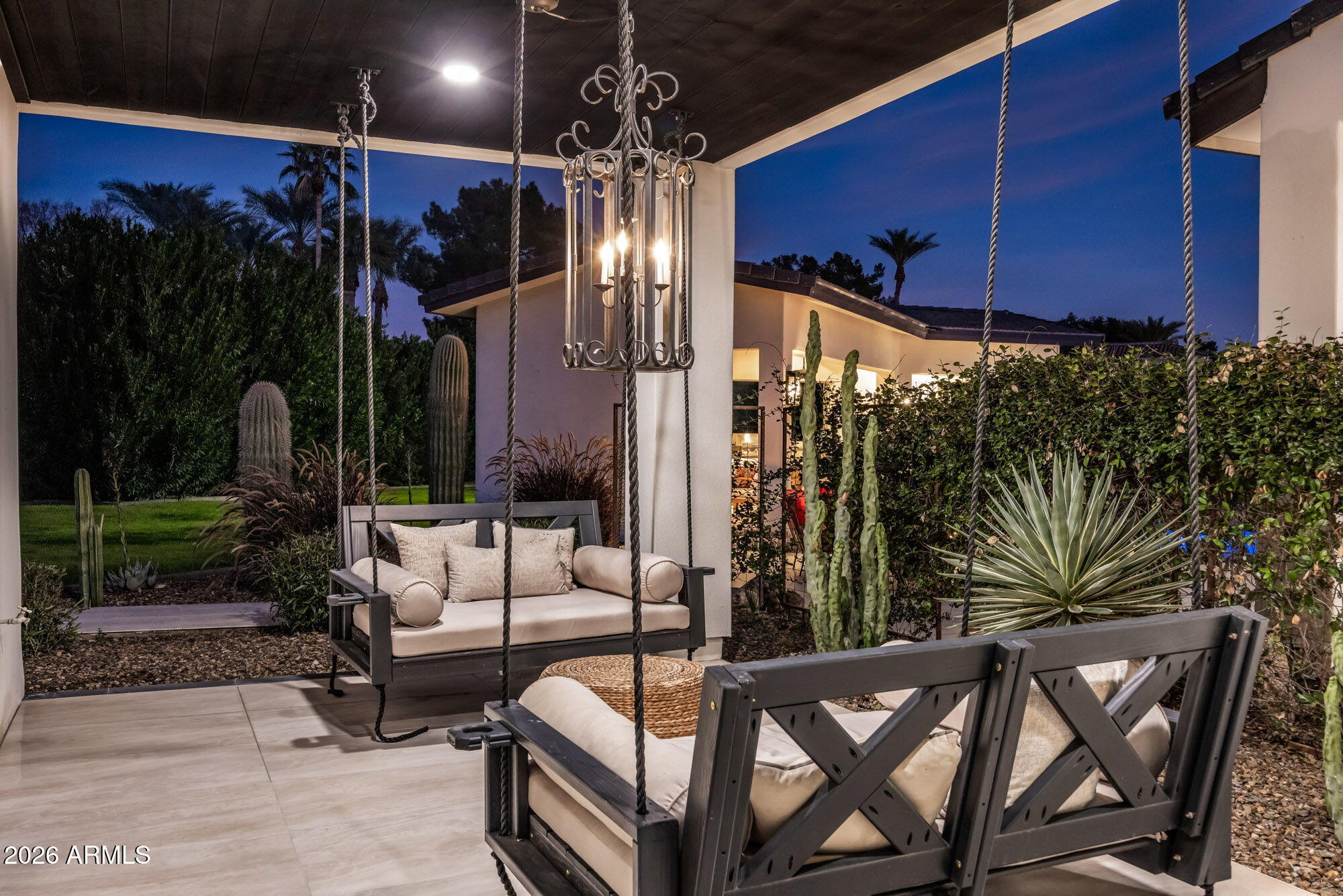 8625 Morning Glory Road Paradise Valley, AZ 85253 - Photo 43 of 52 a view of a chairs and tables in patio