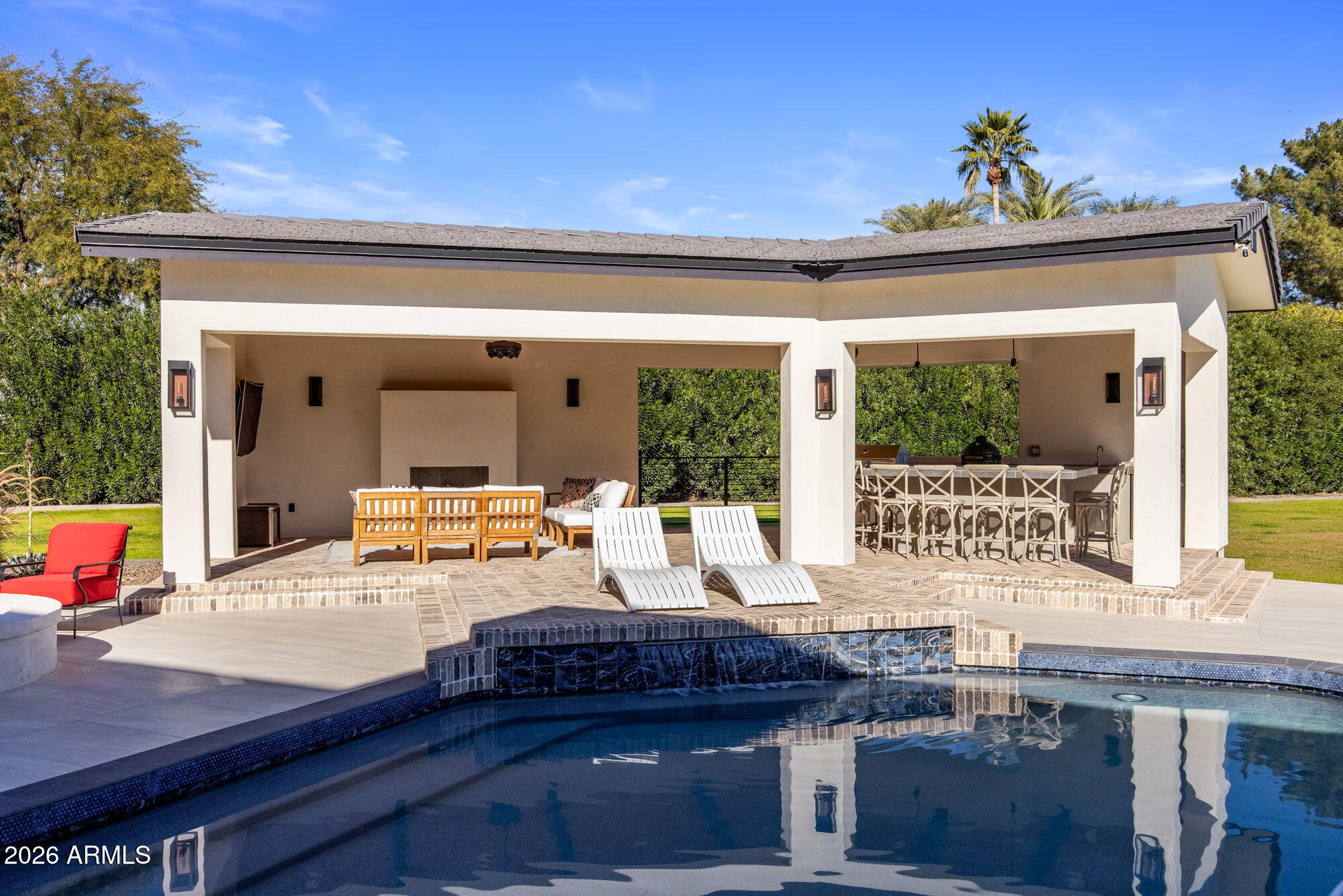 8625 Morning Glory Road Paradise Valley, AZ 85253 - Photo 44 of 52 a bedroom with furniture and large windows