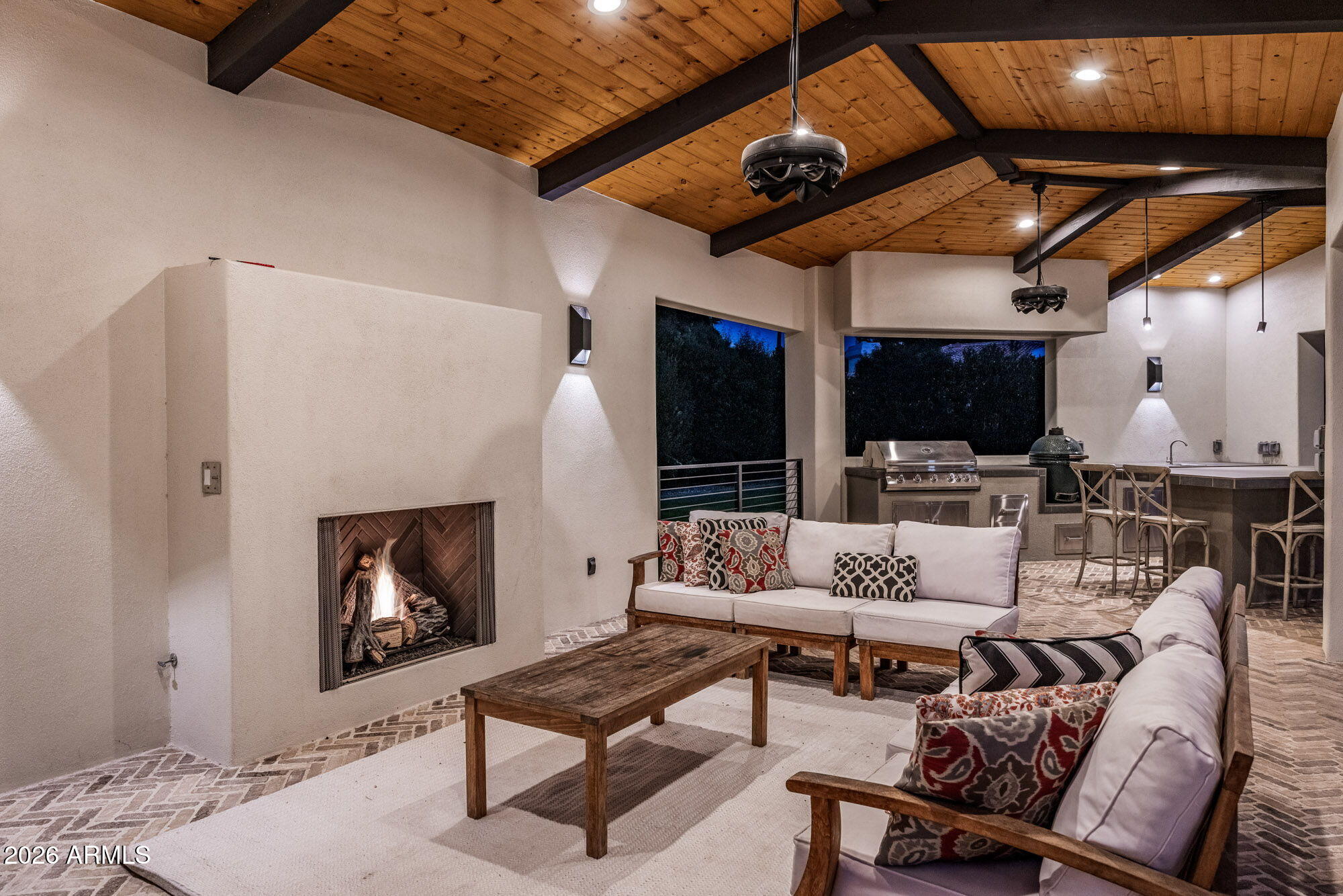 8625 Morning Glory Road Paradise Valley, AZ 85253 - Photo 48 of 52 a outdoor living space with patio furniture and a fireplace