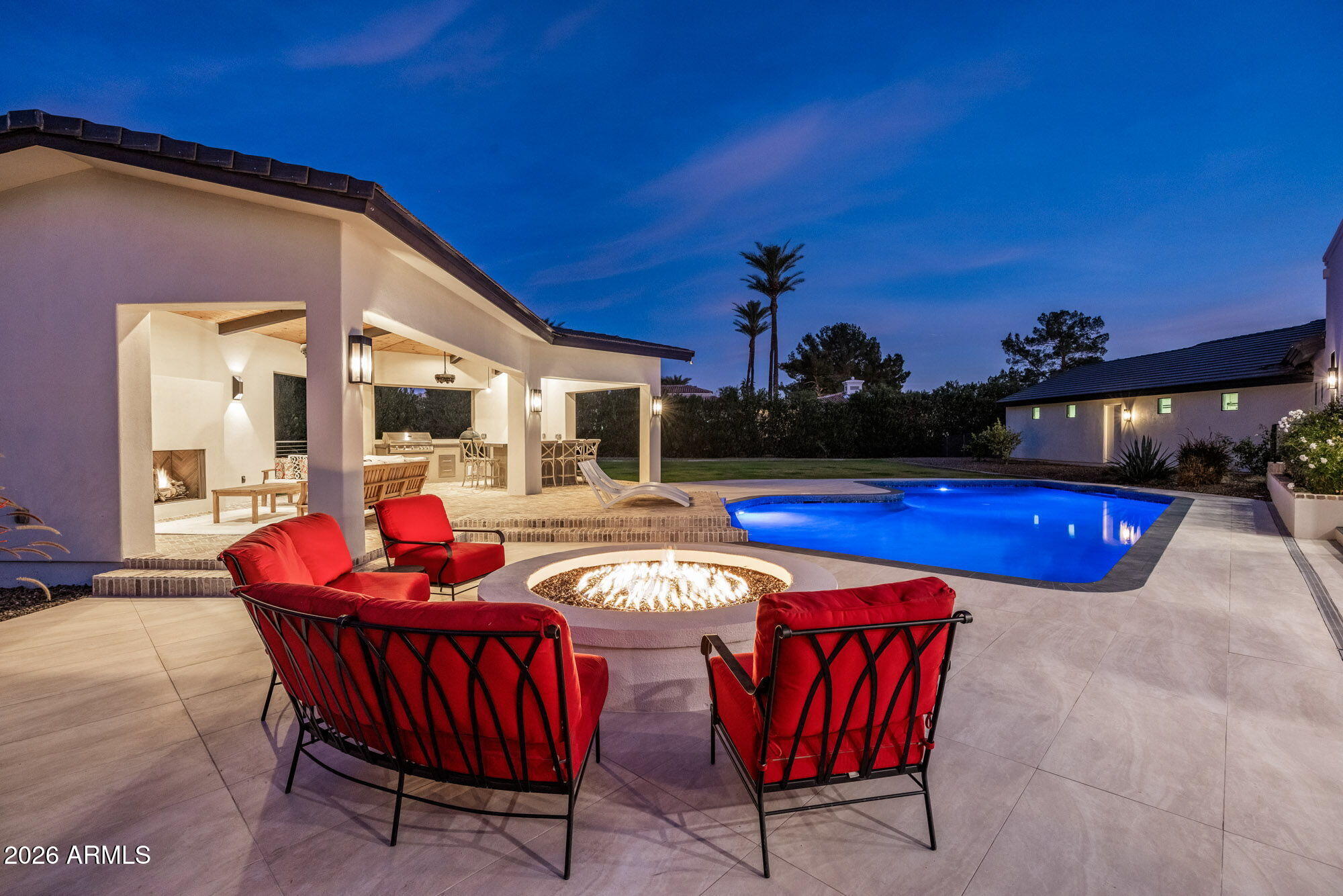 8625 Morning Glory Road Paradise Valley, AZ 85253 - Photo 49 of 52 a view of a chairs and table in the patio