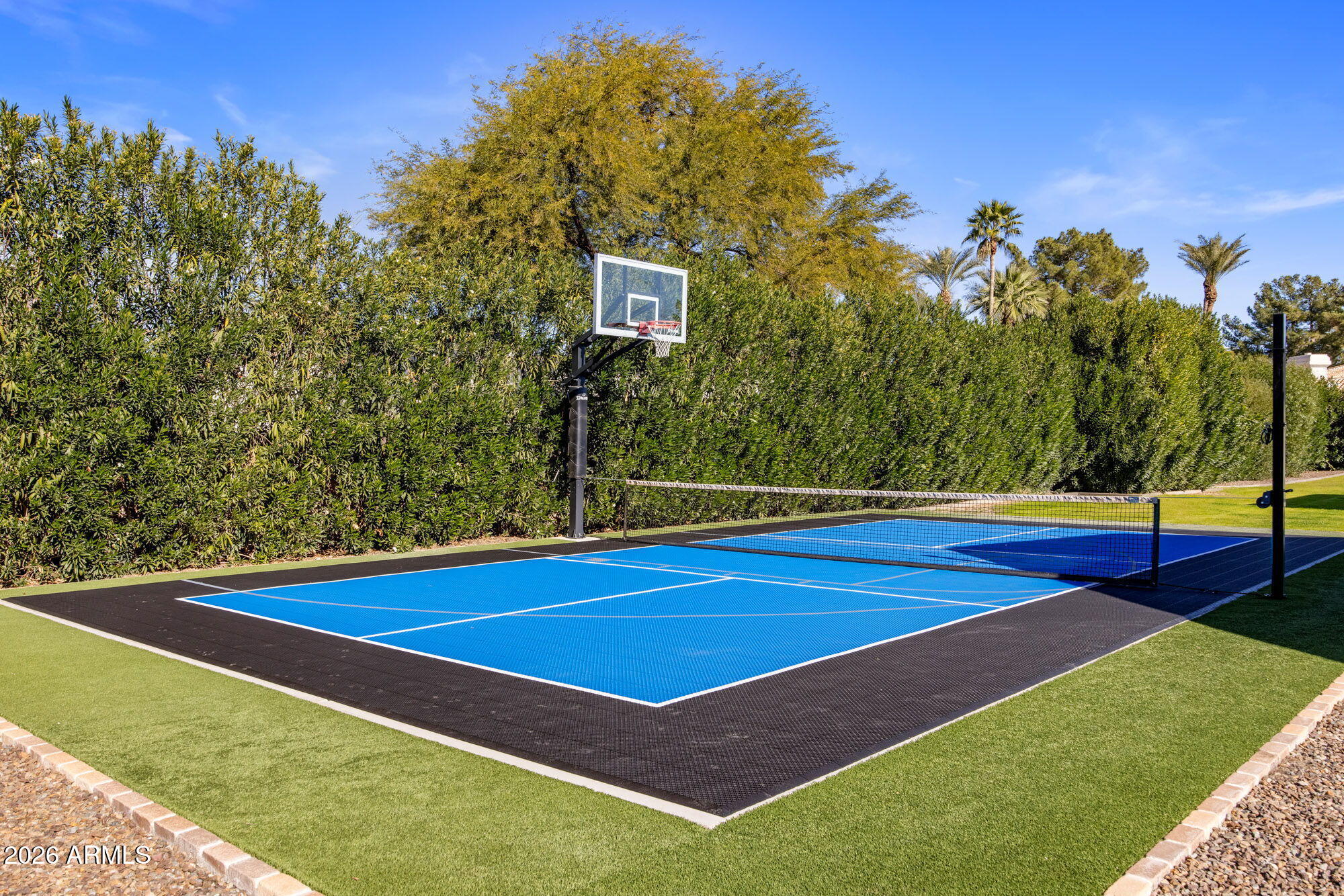 8625 Morning Glory Road Paradise Valley, AZ 85253 - Photo 51 of 52 a view of a tennis court