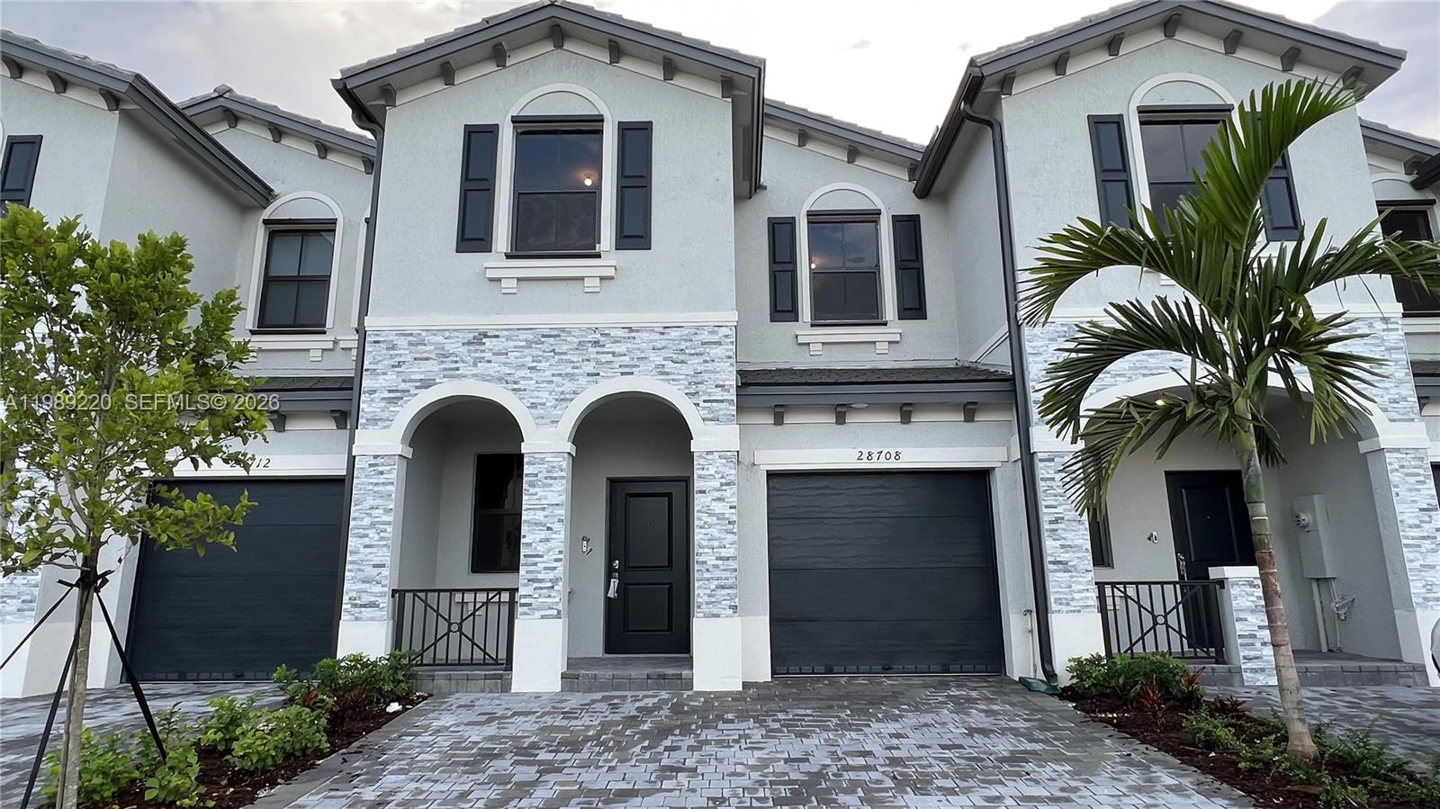 28708 Southwest 134th Court Homestead, FL 33033 - Photo 26 of 26 a front view of a house with plants