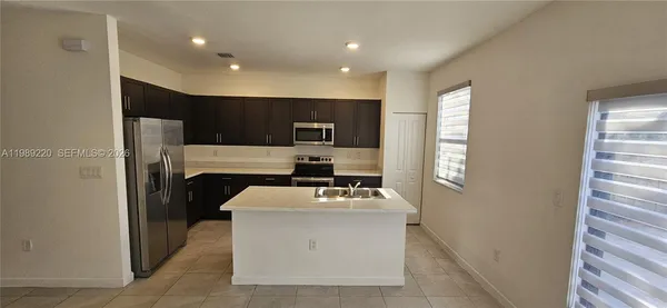 a utility room with washer and dryer