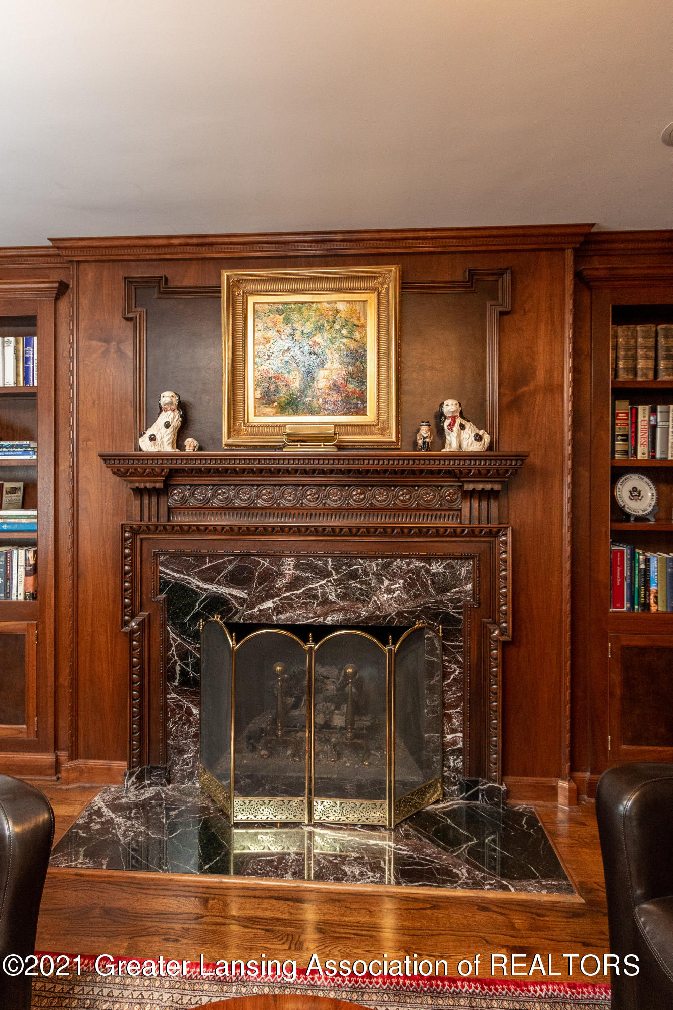627 North Harrison Road East Lansing, MI 48823 - Photo 23 of 94 Newer marble and carved wood surround