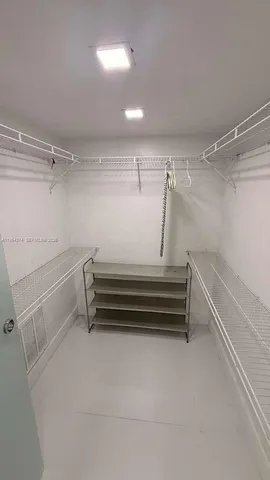 a view of swimming pool with outdoor seating