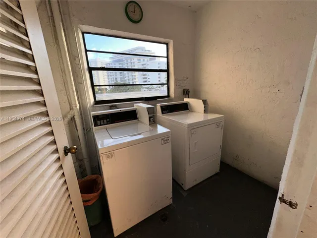 a view of a swimming pool with a lounge chairs