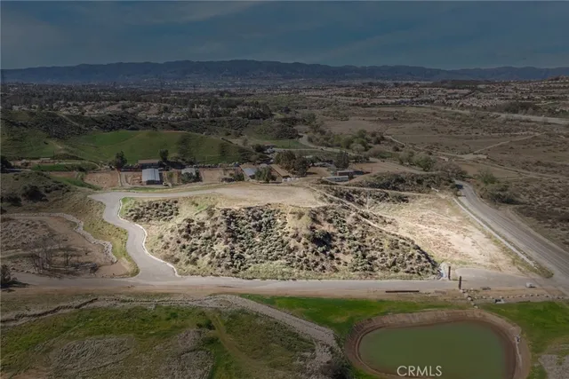 a view of a lake with mountains in the background