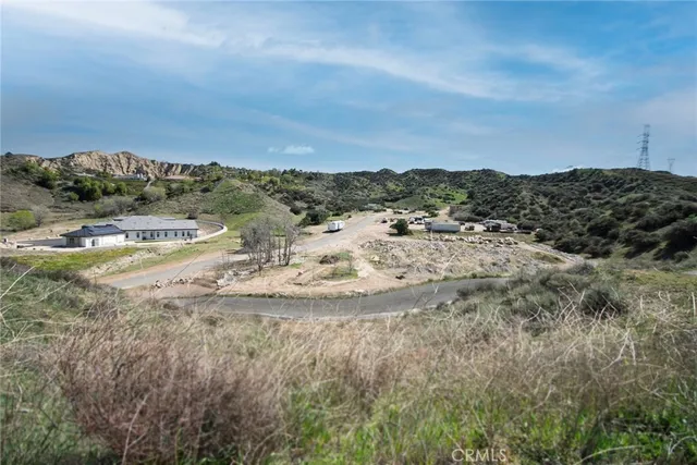 a view of a lake with mountains in the background
