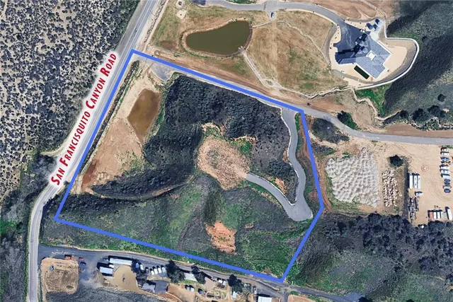 a bird view of a lake from a balcony