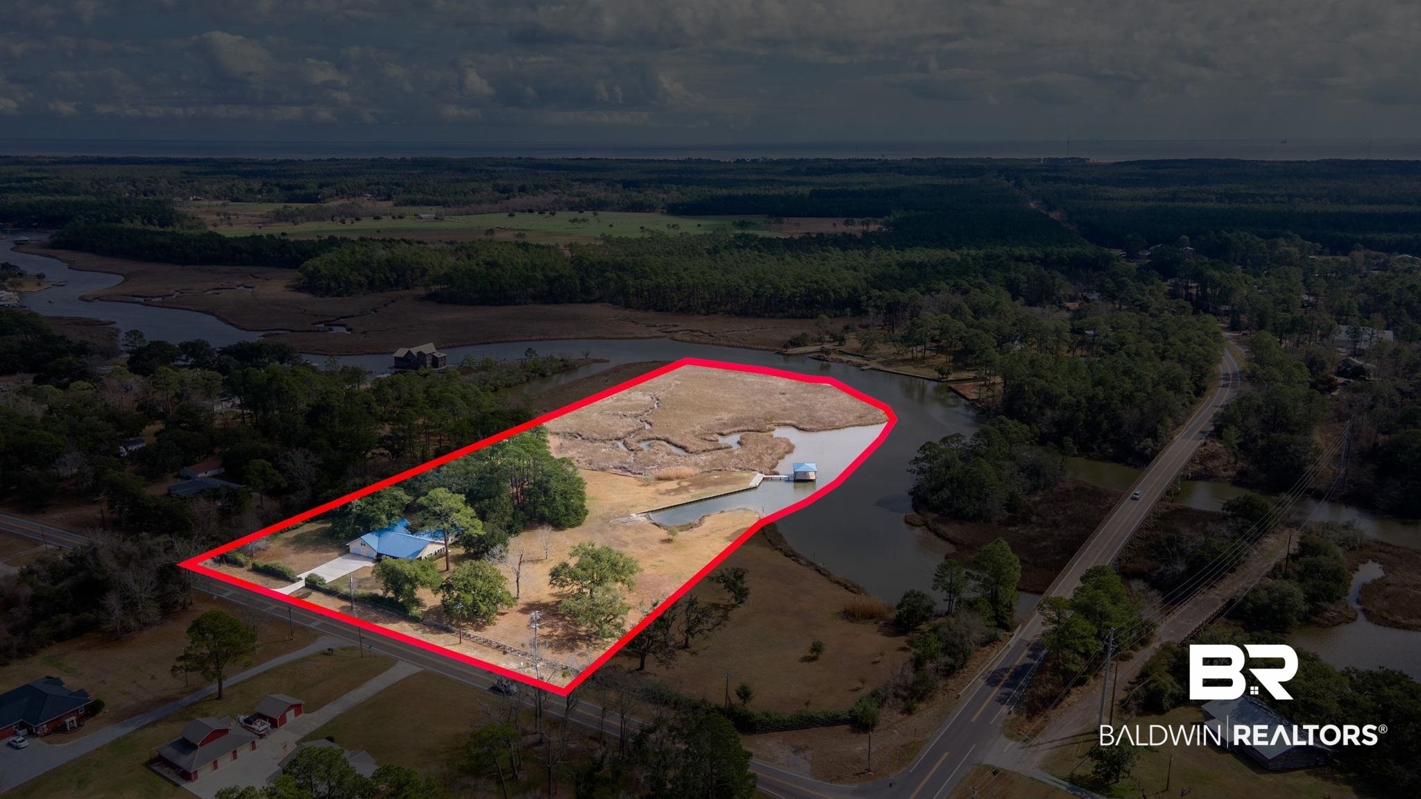 15025 Bellingrath Road Coden, AL 36523 - Photo 72 of 79 Aerial view of property's location with a nearby body of water and property boundaries highlighted