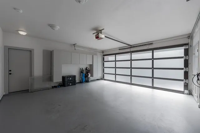 a view of a livingroom with furniture and a ceiling fan