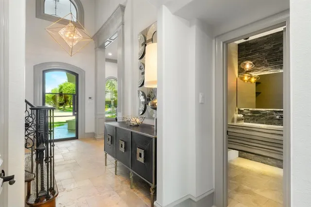 a en suite bathroom with a sink a mirror and shower