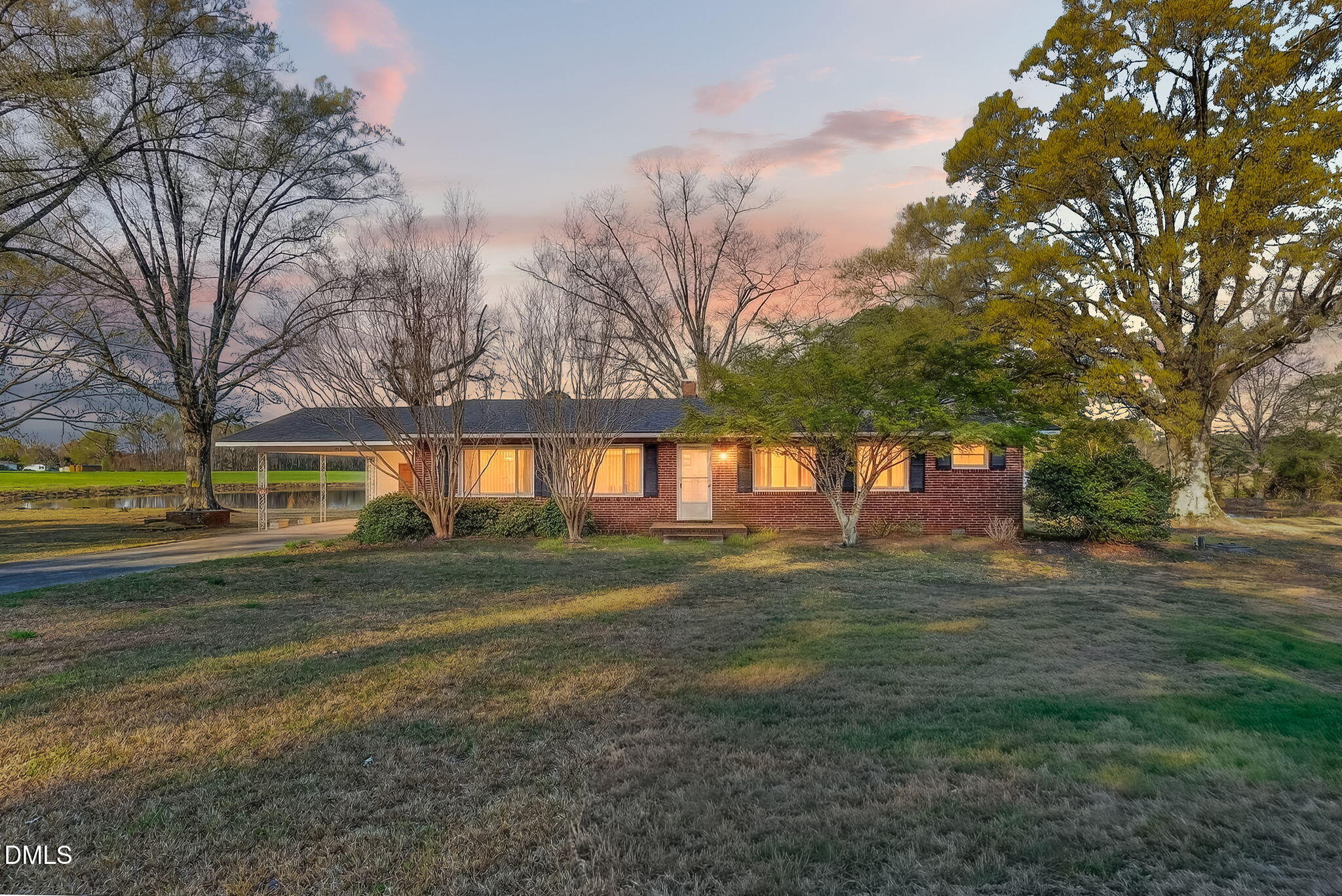 10167 Highway 50 Angier, NC 27501 - Photo 1 of 17 a big yard with large trees