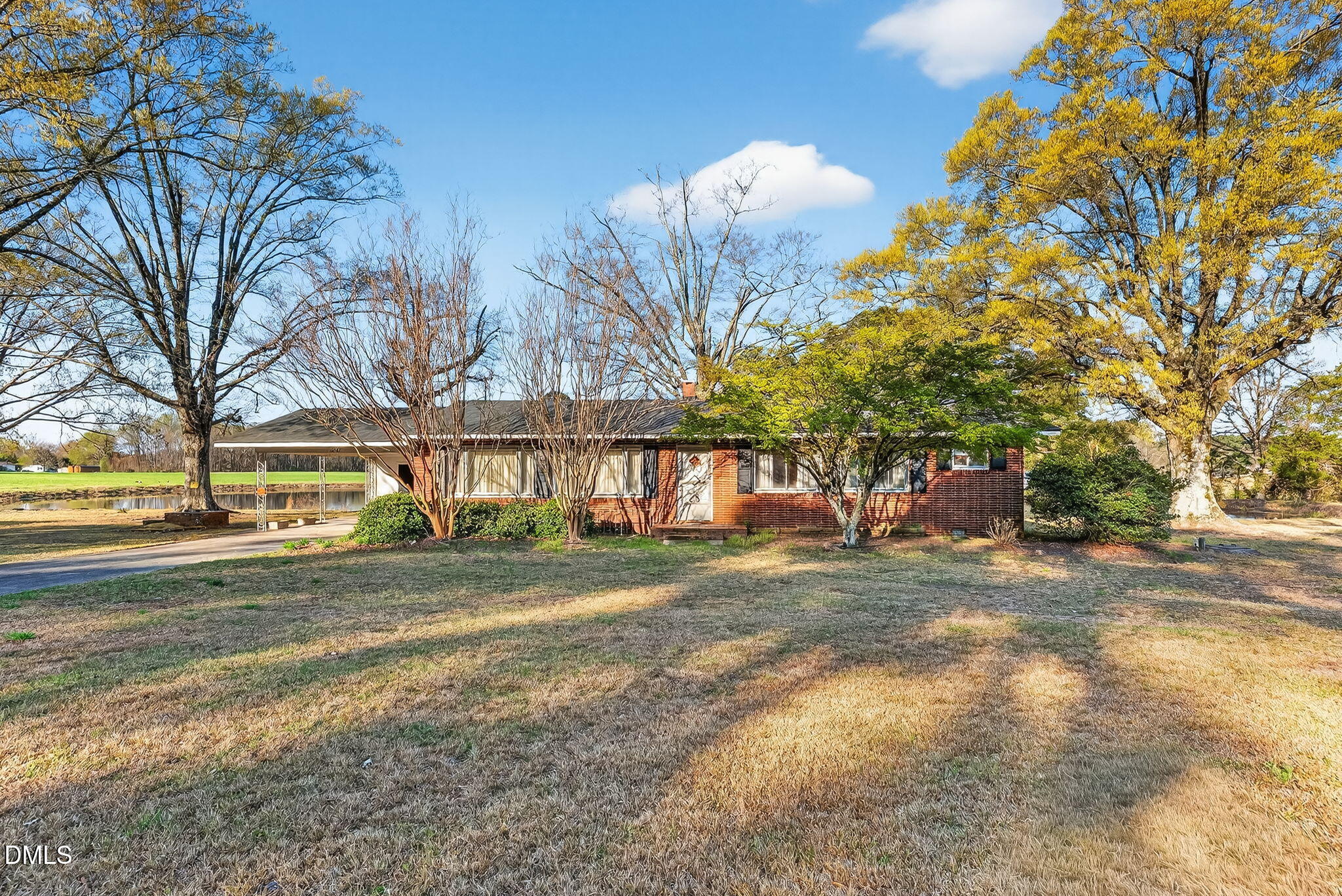 10167 Highway 50 Angier, NC 27501 - Photo 2 of 17 a view of a house with a yard