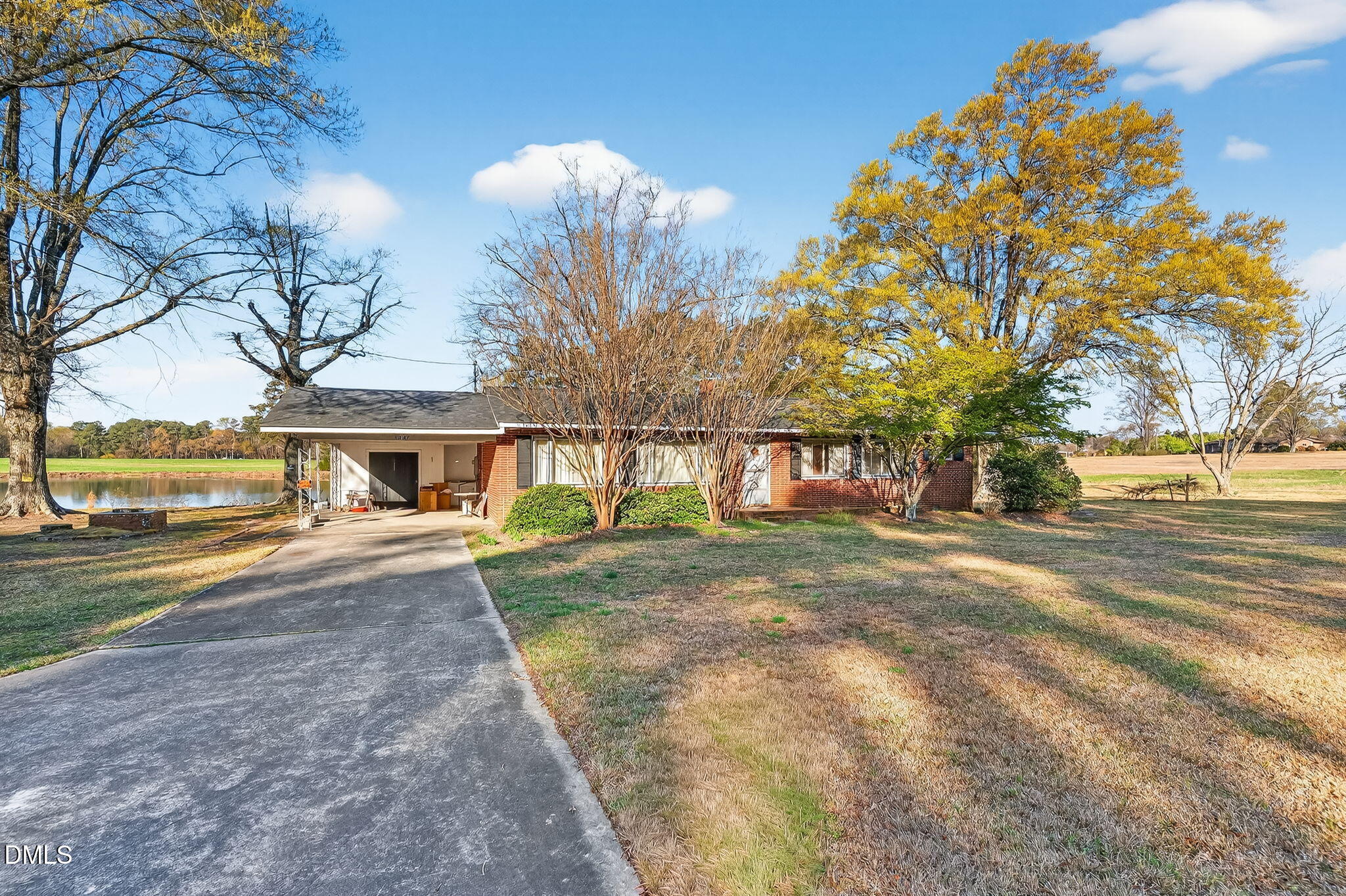 10167 Highway 50 Angier, NC 27501 - Photo 4 of 17 a view of a large trees in front of a house