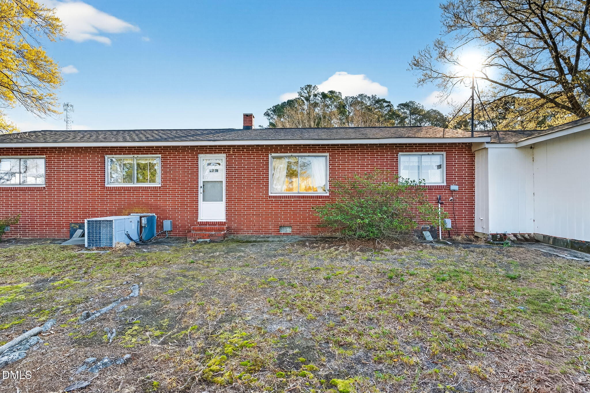 10167 Highway 50 Angier, NC 27501 - Photo 6 of 17 a view of front of a house with a yard