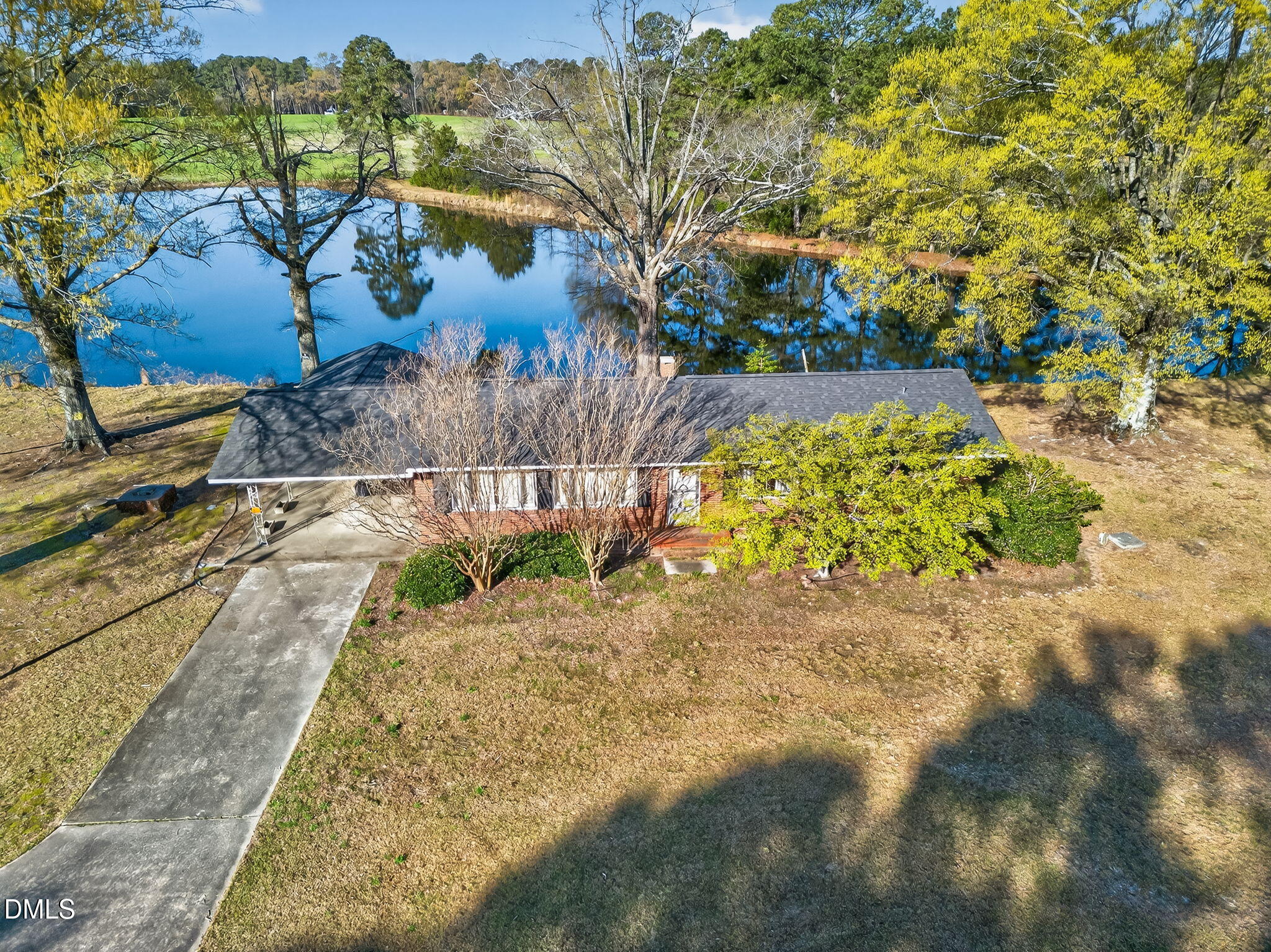 10167 Highway 50 Angier, NC 27501 - Photo 9 of 17 a view of a yard with plants and large trees
