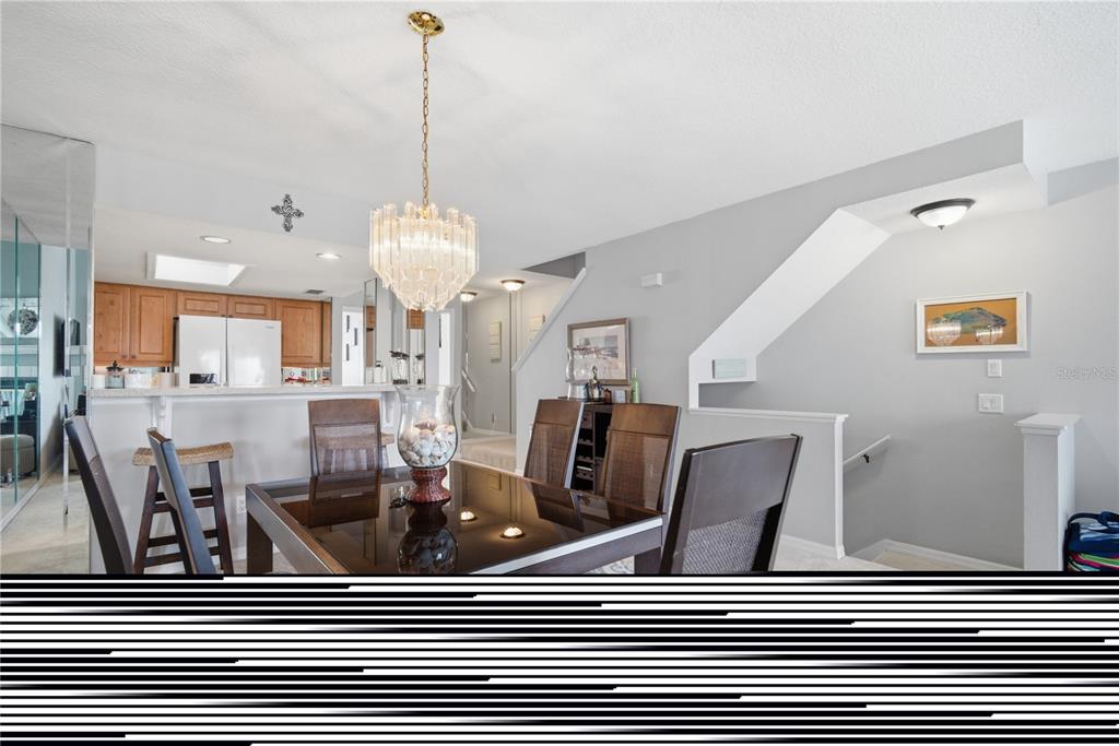643 Garland Circle Indian Rocks Beach, FL 33785 - Photo 17 of 81 a view of a dining room with furniture