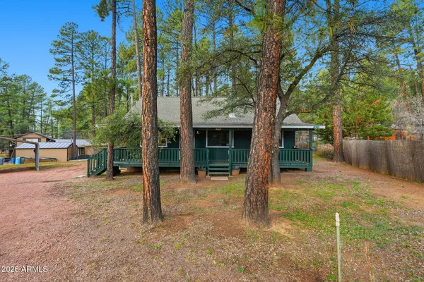 a house with trees in front of it