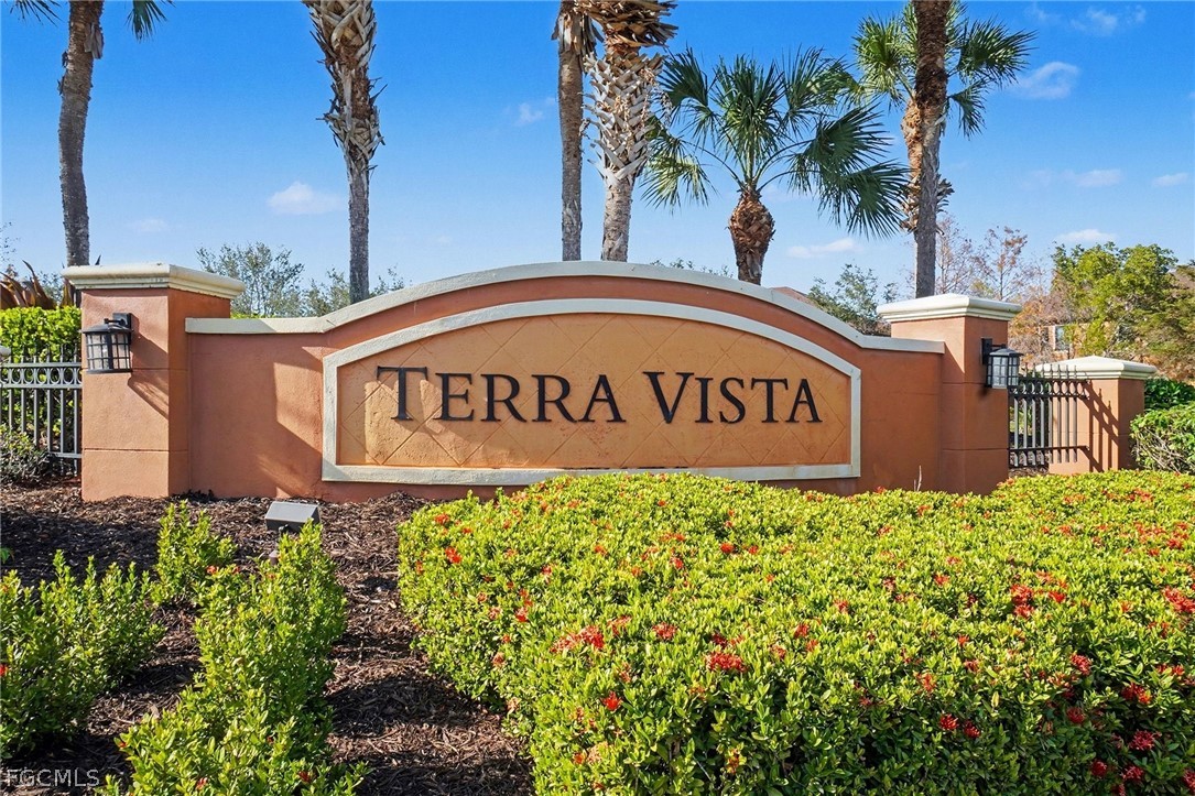 3799 Costa Maya Way, Unit 101 Estero, FL 33928 - Photo 2 of 35 a sign board with a house in the background