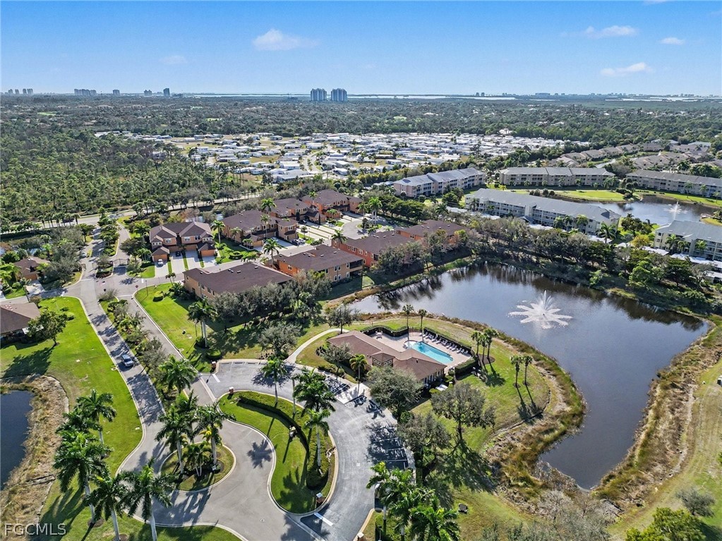 3799 Costa Maya Way, Unit 101 Estero, FL 33928 - Photo 28 of 35 an aerial view of a house with a lake view