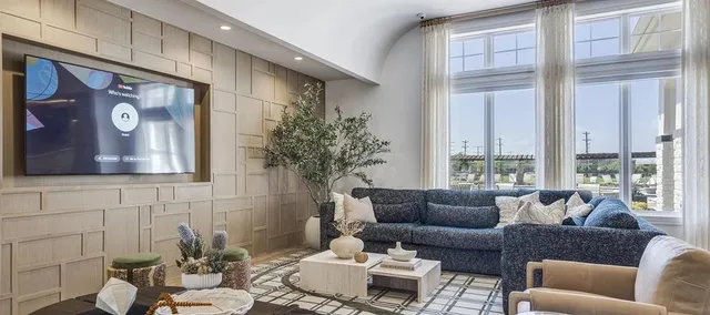 a kitchen with stainless steel appliances granite countertop a stove and a refrigerator