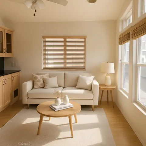 a living room with furniture and a window