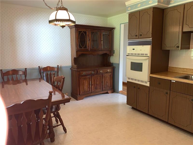 204 Reed Street Lower Burrell, PA 15068 - Photo 10 of 22 If buyer needs the kitchen table, chairs and hutch...they are welcome to it.