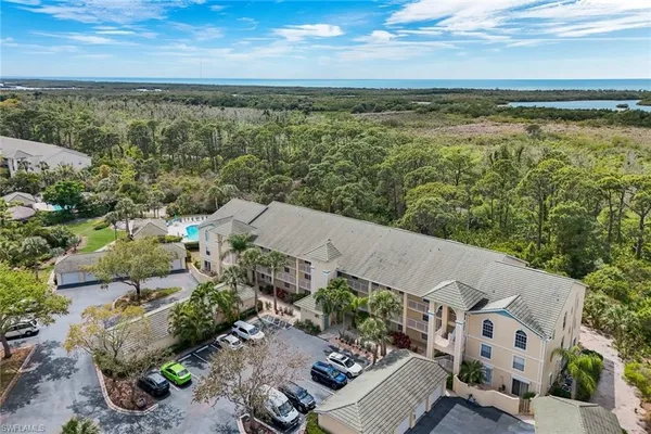 an aerial view of residential house with outdoor space