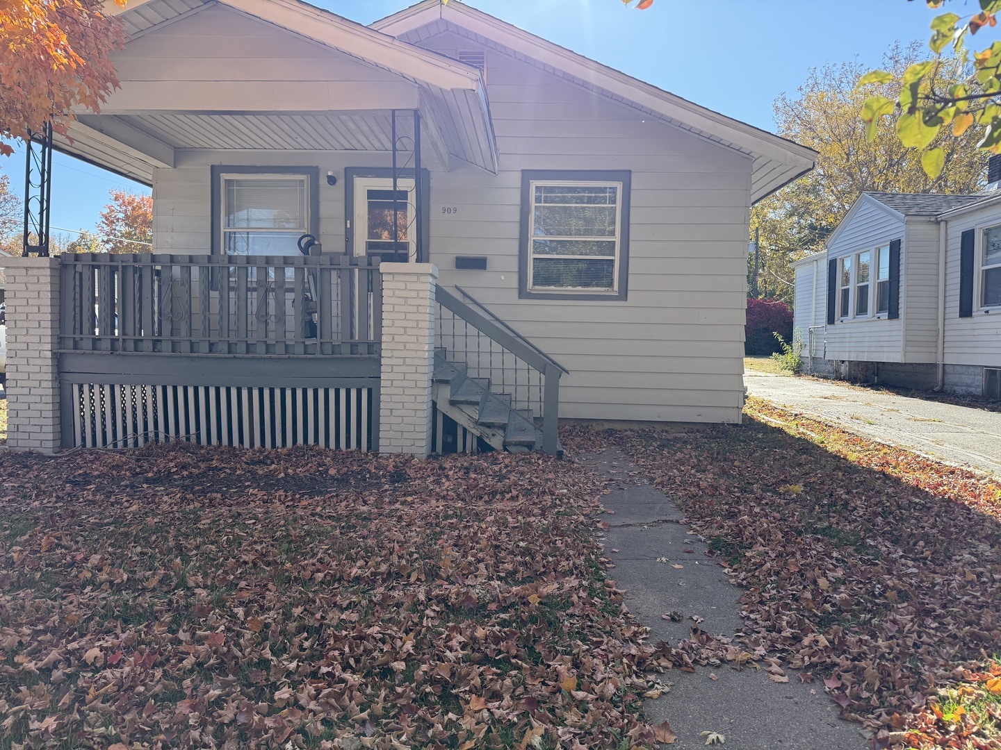 909 West Cushing Street Decatur, IL 62526 - Photo 6 of 6 a view of a house with wooden fence