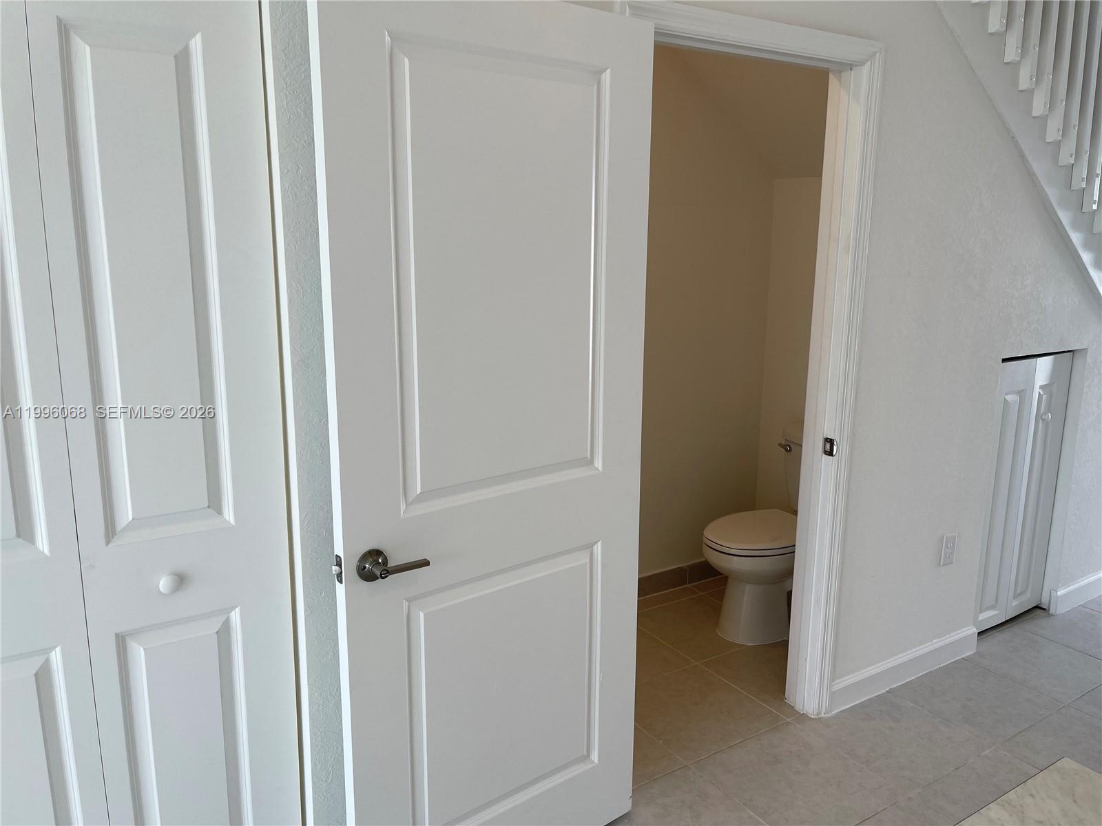 13262 Southwest 287th Terrace Homestead, FL 33033 - Photo 29 of 33 a bathroom with a toilet